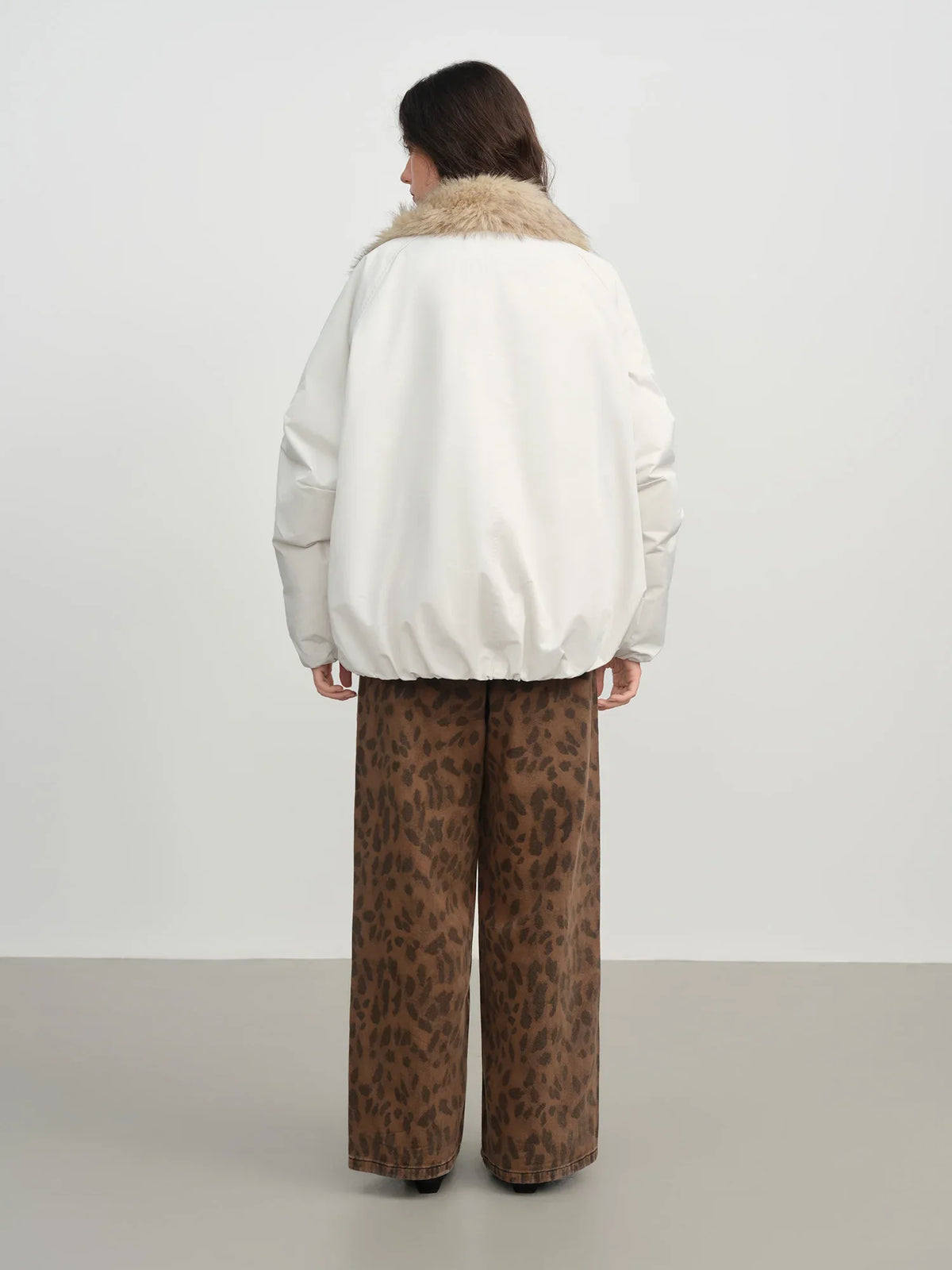 Veste femme ample en duvet à col duveteux FSLE – CLEVI Paris