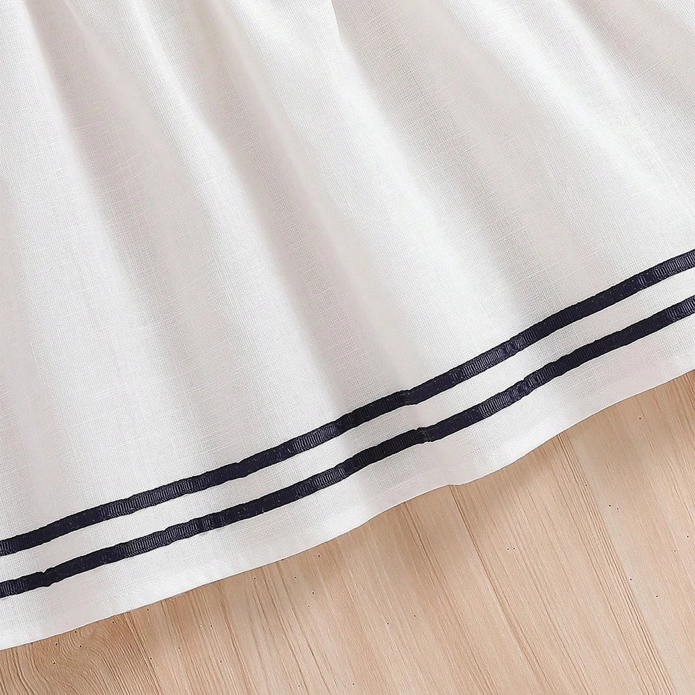 Robe fille en blanc et en coton style preppy – CLEVI Paris