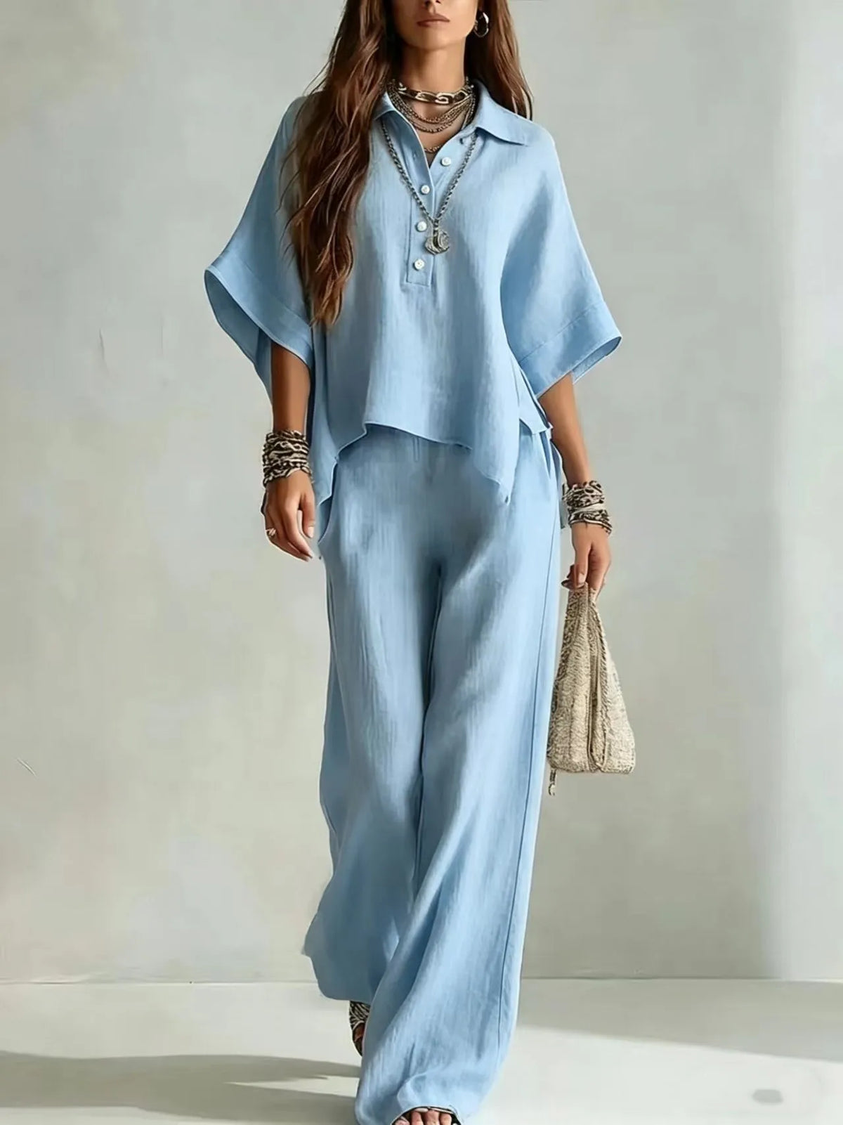 Ensemble femme haut col V et pantalon large – CLEVI Paris