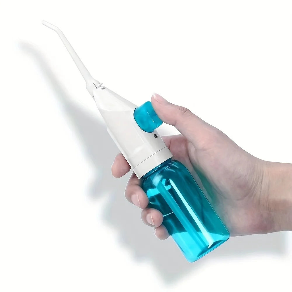 Irrigateur buccal manuel portable – CLEVI Paris