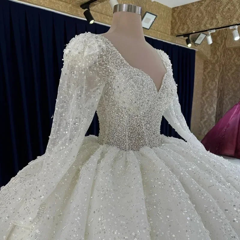 Robe de mariée princesse pailletée à col cœur – CLEVI Paris
