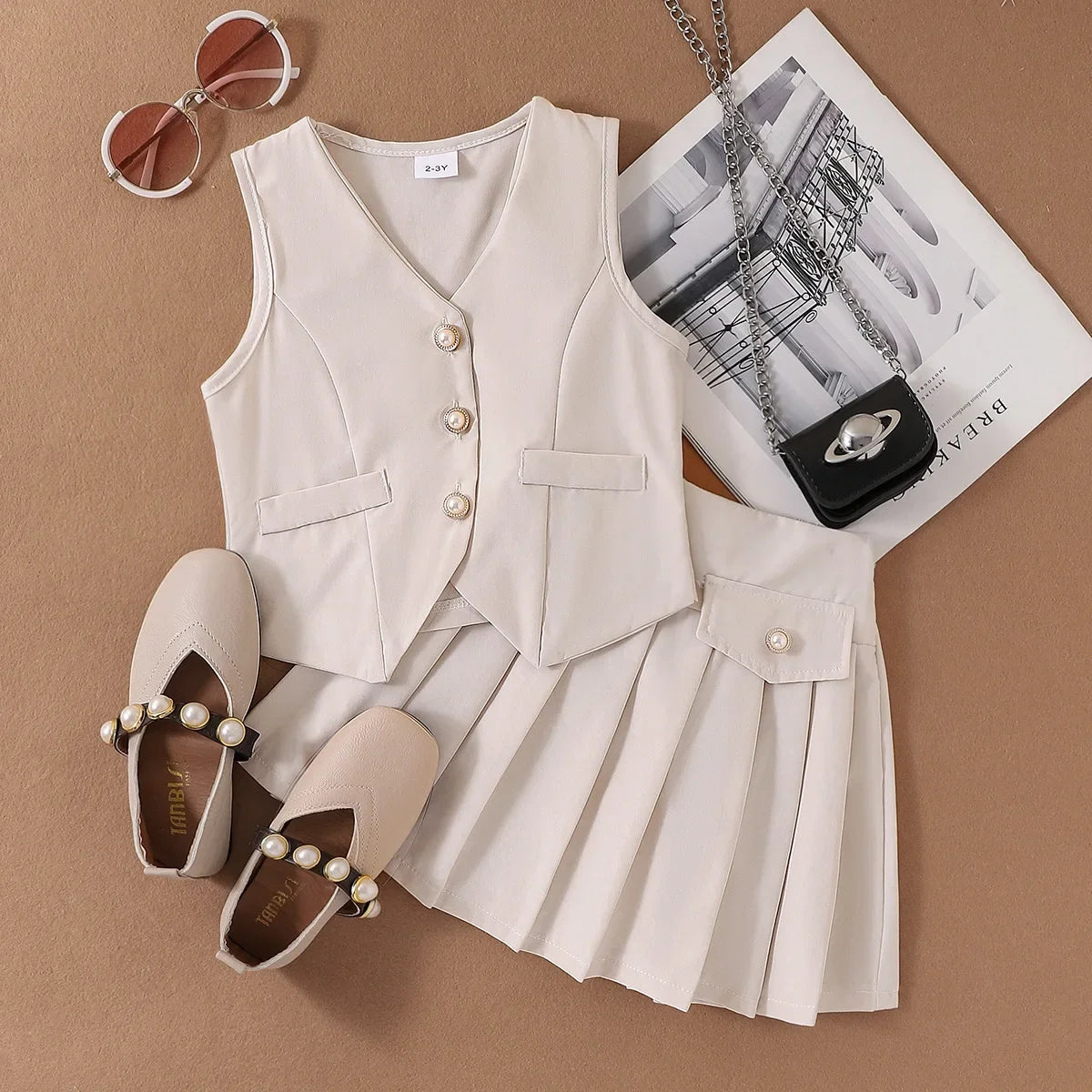 Ensemble fille gilet col V et jupe plissée – CLEVI Paris