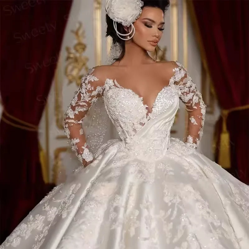 Robe de mariée princesse à manches longues – CLEVI Paris