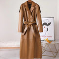 Trench long femme en cuir ceinturé – CLEVI Paris