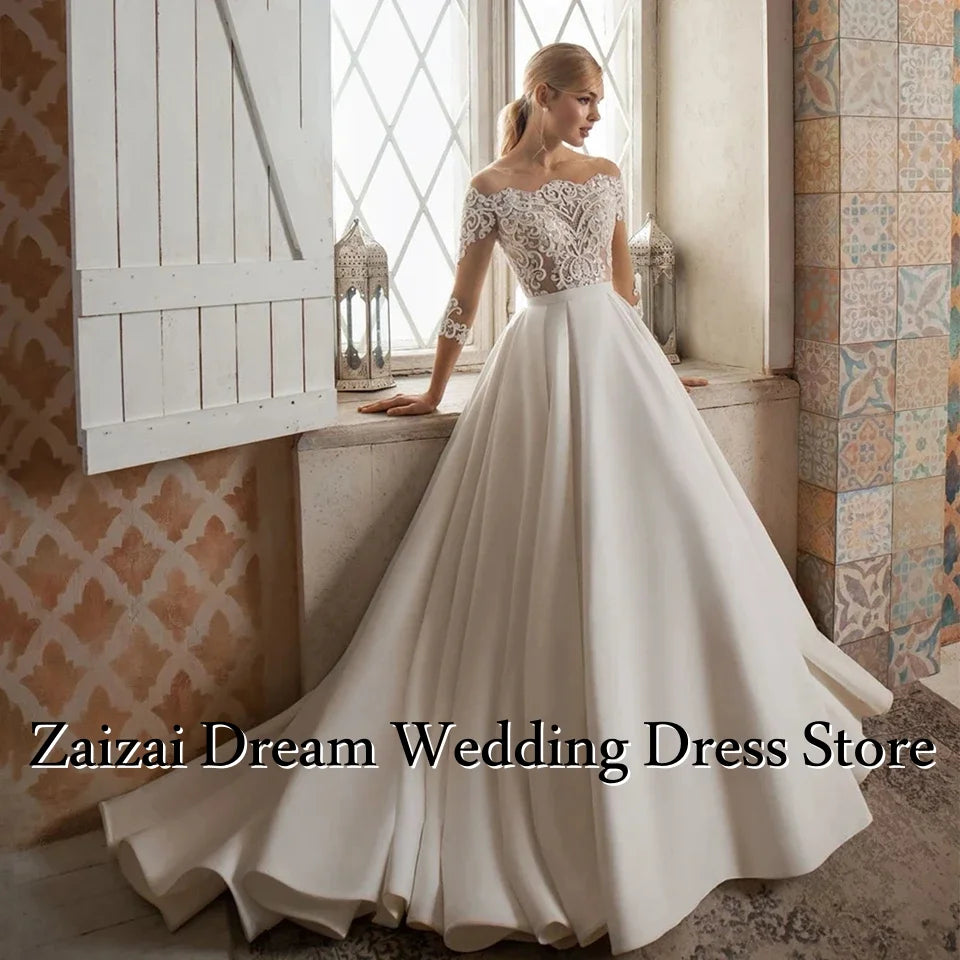 Robe de mariée satinée ligne A épaules dénudées – CLEVI Paris
