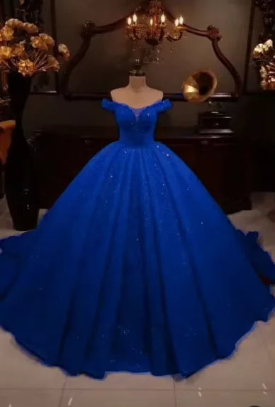 Robe de bal perlée en organza col cœur – CLEVI Paris