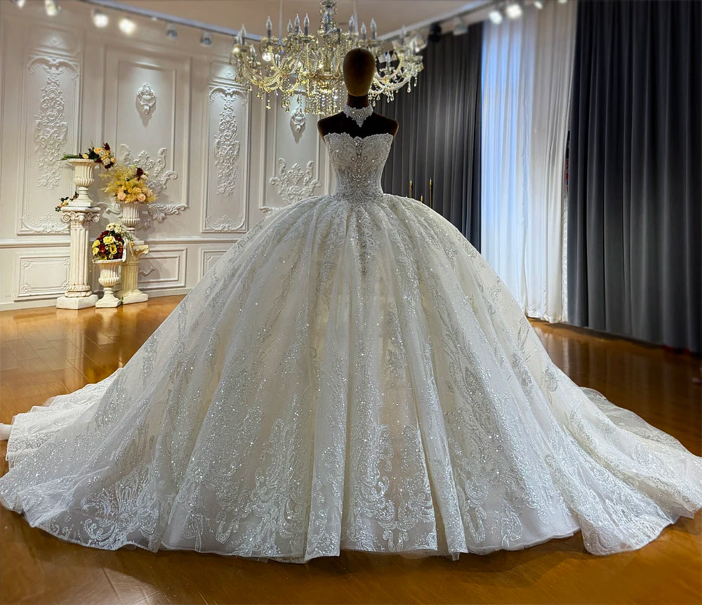 Robe de mariée fleurie col bateau – CLEVI Paris