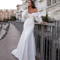 Robe de mariée sirène en satin, col V – CLEVI Paris