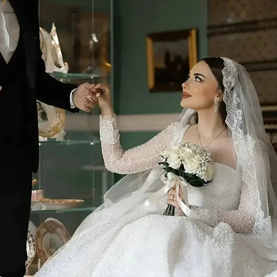 Robe de mariée trapèze perlée à dos ouvert – CLEVI Paris