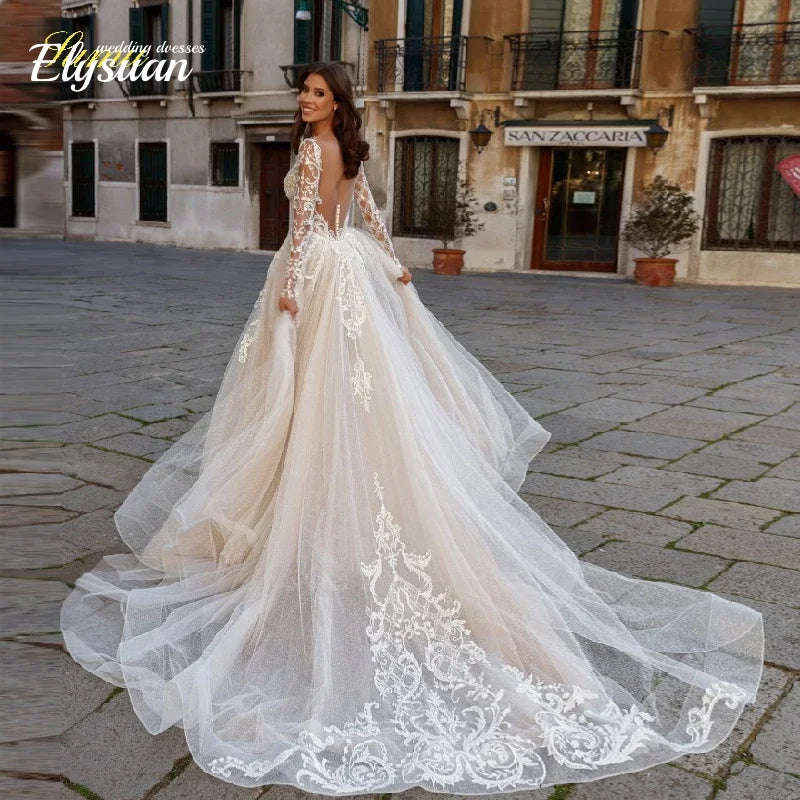 Robe de mariée sirène en tulle manches longues – CLEVI Paris