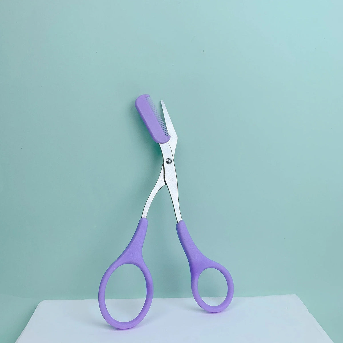 Ciseaux à sourcils avec peigne – CLEVI Paris