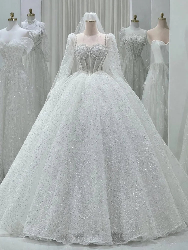Robe de mariée en tulle perlée – CLEVI Paris