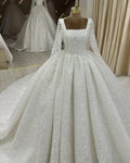 Robe de mariée princesse perlée à col carré – CLEVI Paris