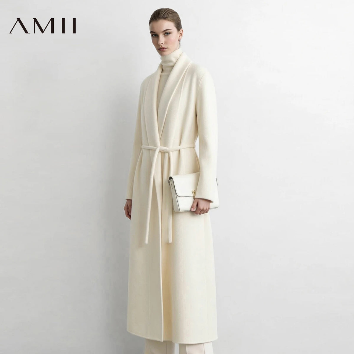 Manteau long AMII en laine et alpaga ceinturé – CLEVI Paris