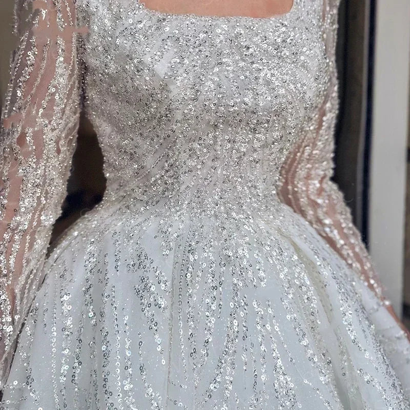 Robe de mariée princesse en tulle col carré – CLEVI Paris