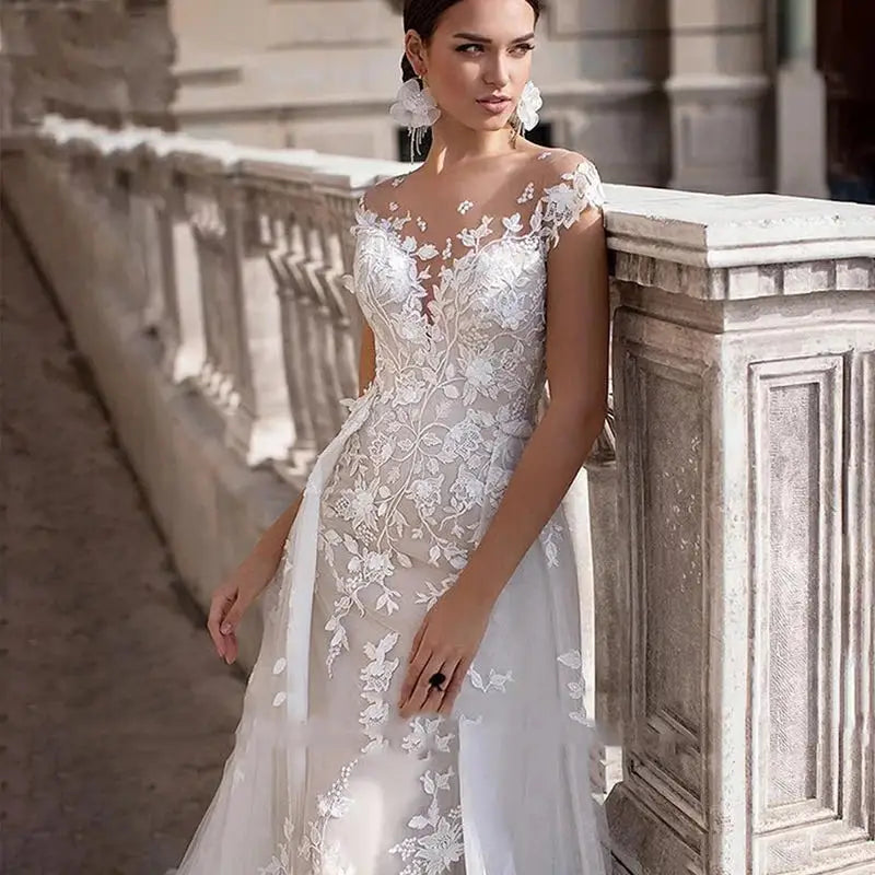 Robe de mariée trapèze manches courtes – CLEVI Paris