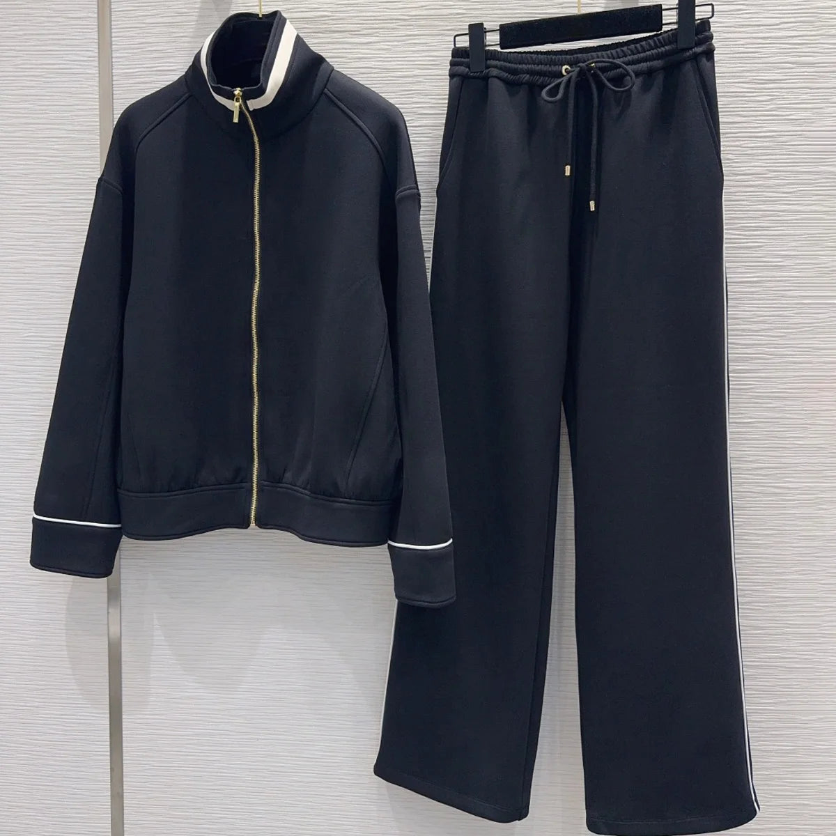 Ensemble femme veste zippée et pantalon large – CLEVI Paris