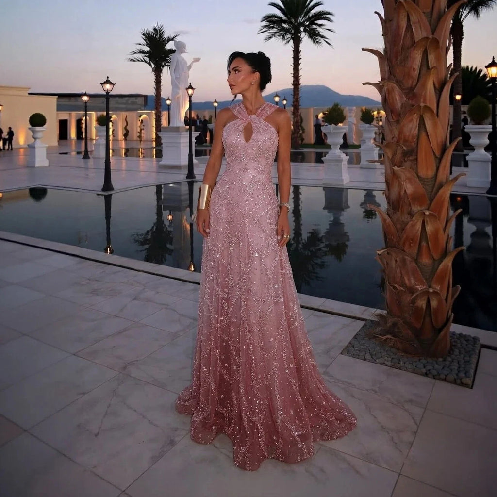Robe de soirée trapèze perlée et croisée – CLEVI Paris