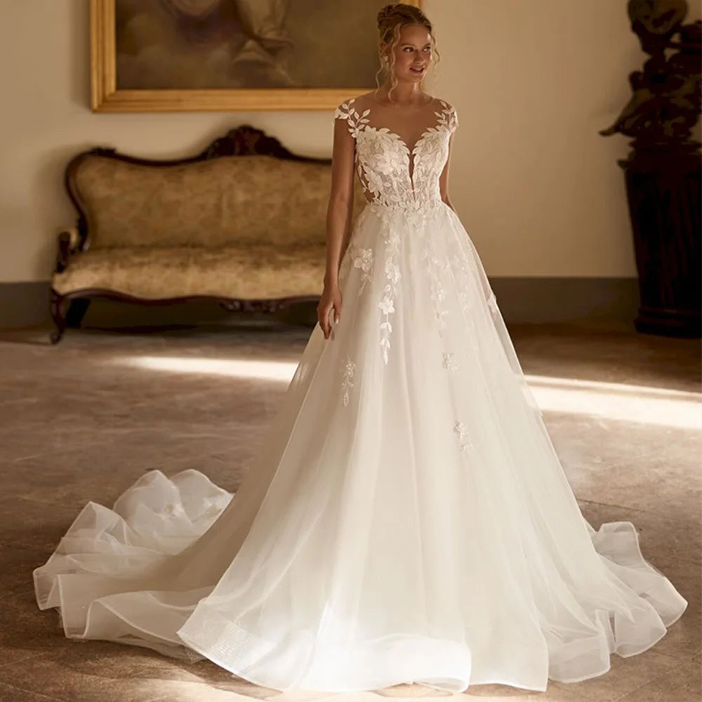 Robe de mariée en organza, ligne A et appliques - CLEVI Paris