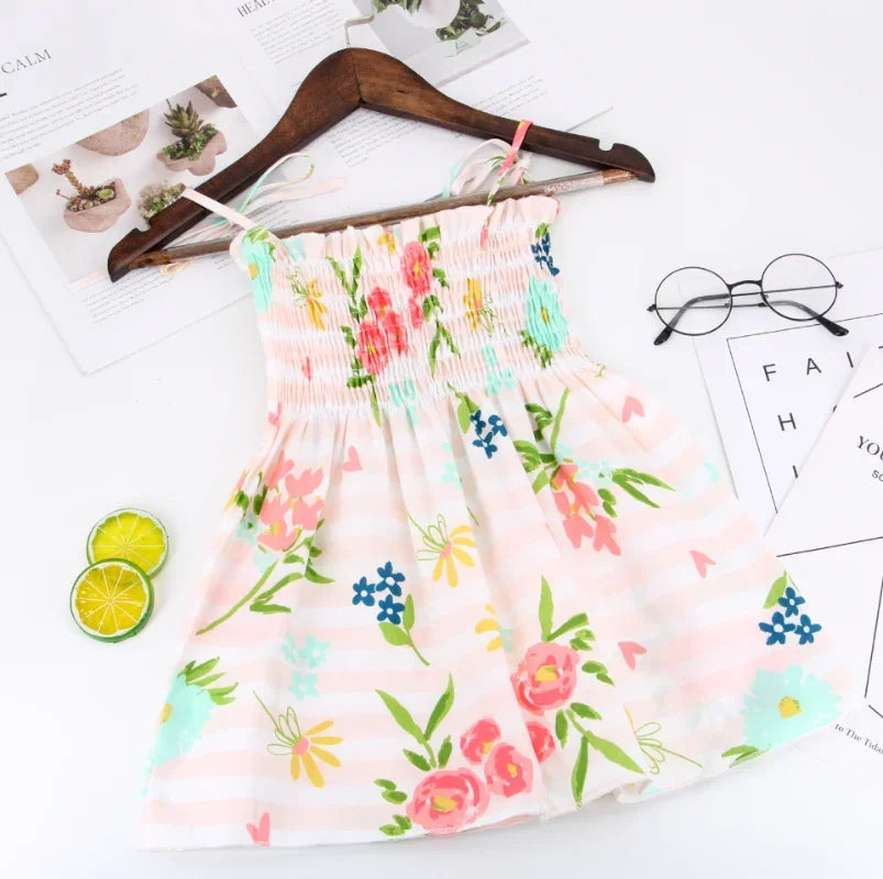 Robe d’été fille à fleurs sans manches – CLEVI Paris