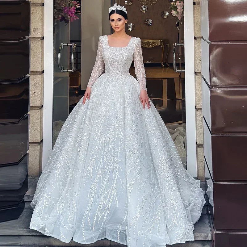 Robe de mariée princesse en tulle à perles – CLEVI Paris