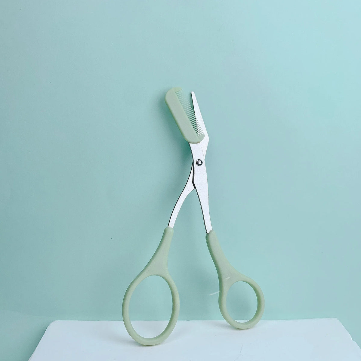 Ciseaux à sourcils avec peigne – CLEVI Paris