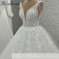Robe de mariée ligne A en dentelle à perles – CLEVI Paris