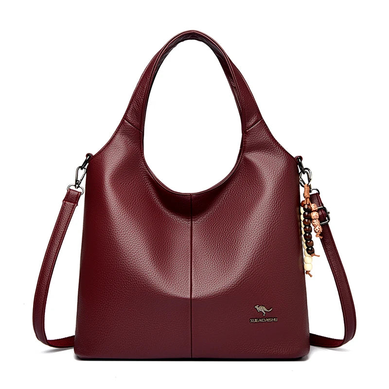 Sac seau femme souple à pompon – CLEVI Paris