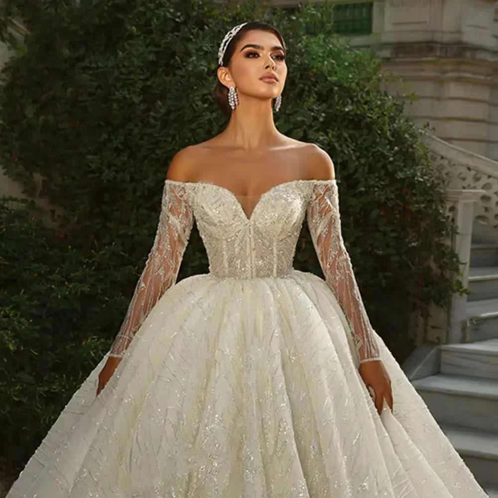 Robe de mariée épaules nues perlée – CLEVI Paris