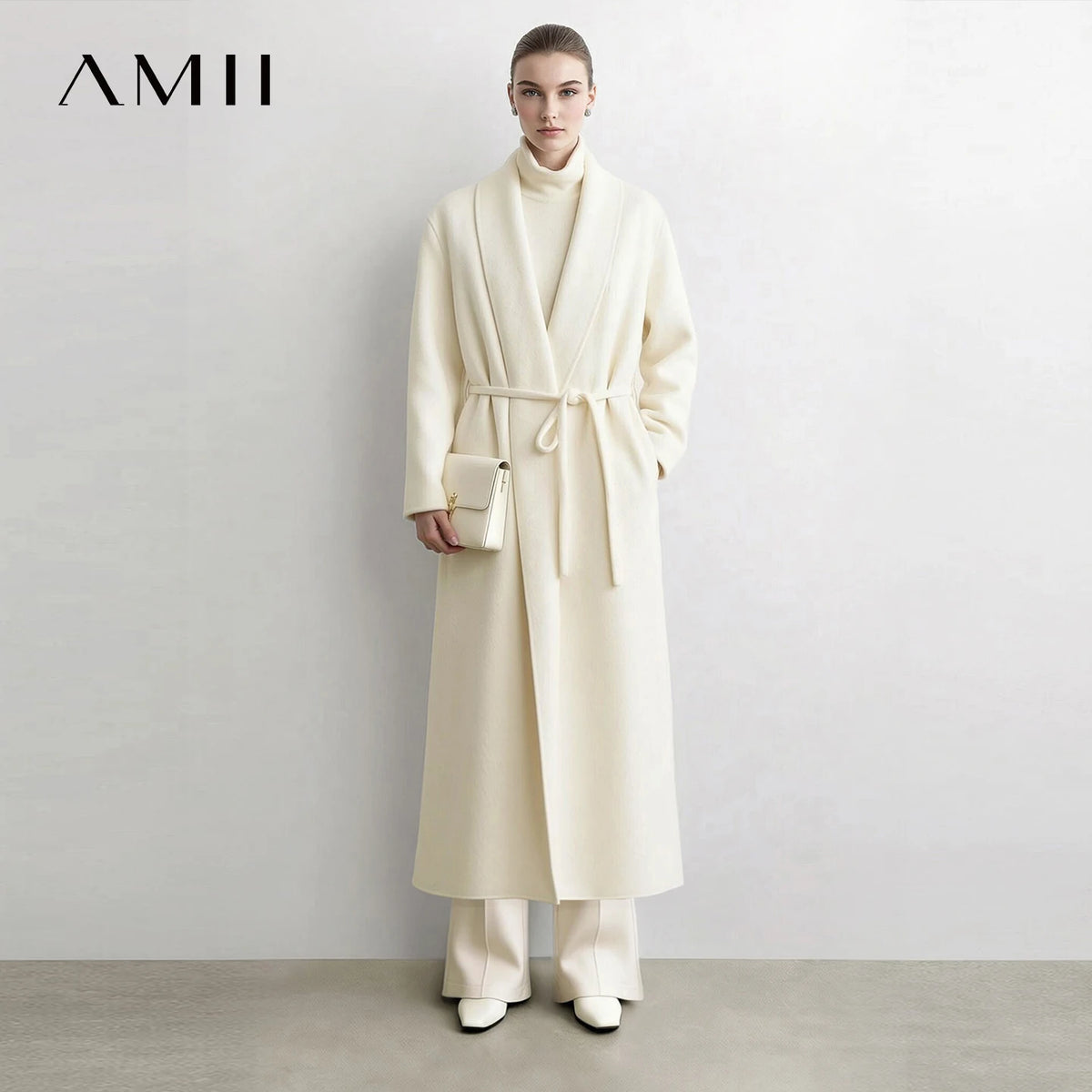 Manteau long AMII en laine et alpaga ceinturé – CLEVI Paris