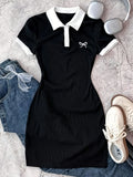 Robe polo fille en noire à motif nœud – CLEVI Paris