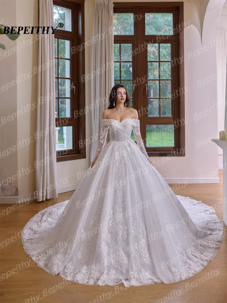 Robe de mariée princesse à perles – CLEVI Paris