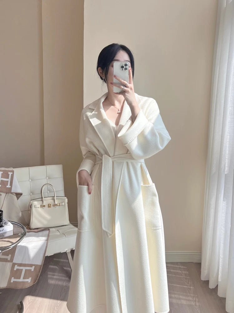 Manteau long femme à ceinture et col revers – CLEVI Paris