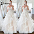 Robe de mariée A-line à volants – CLEVI Paris