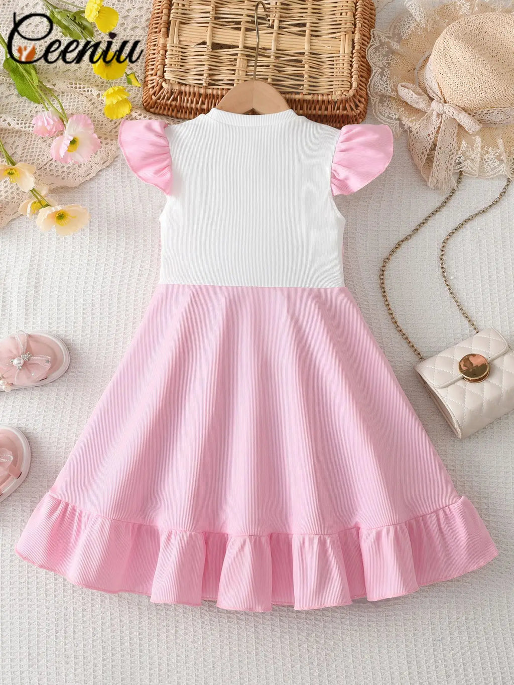 Robe fille rose à fleurs en relief – CLEVI Paris