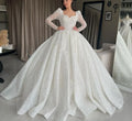 Robe de mariée en dentelle perlée – CLEVI Paris