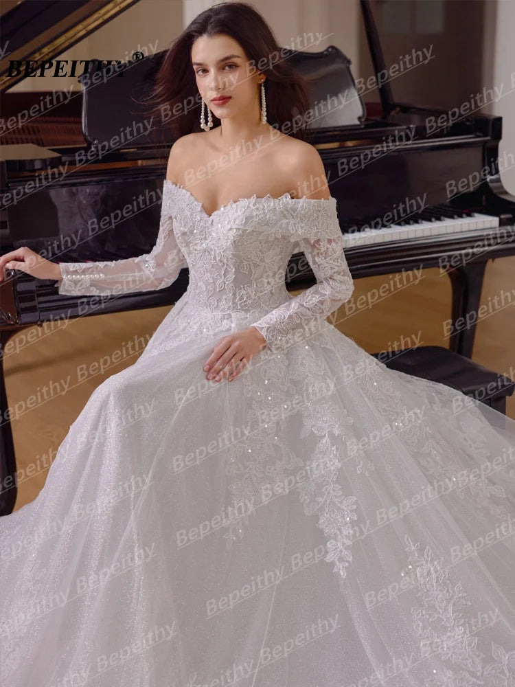 Robe de mariée princesse à perles – CLEVI Paris