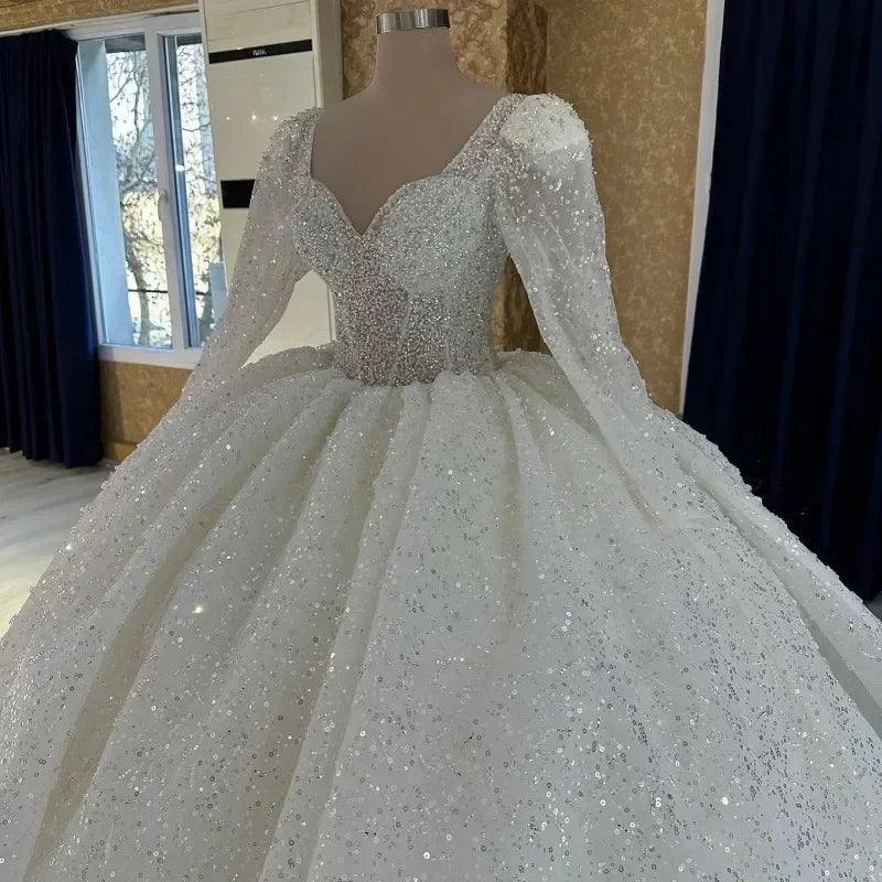 Robe de mariée princesse pailletée à col cœur – CLEVI Paris