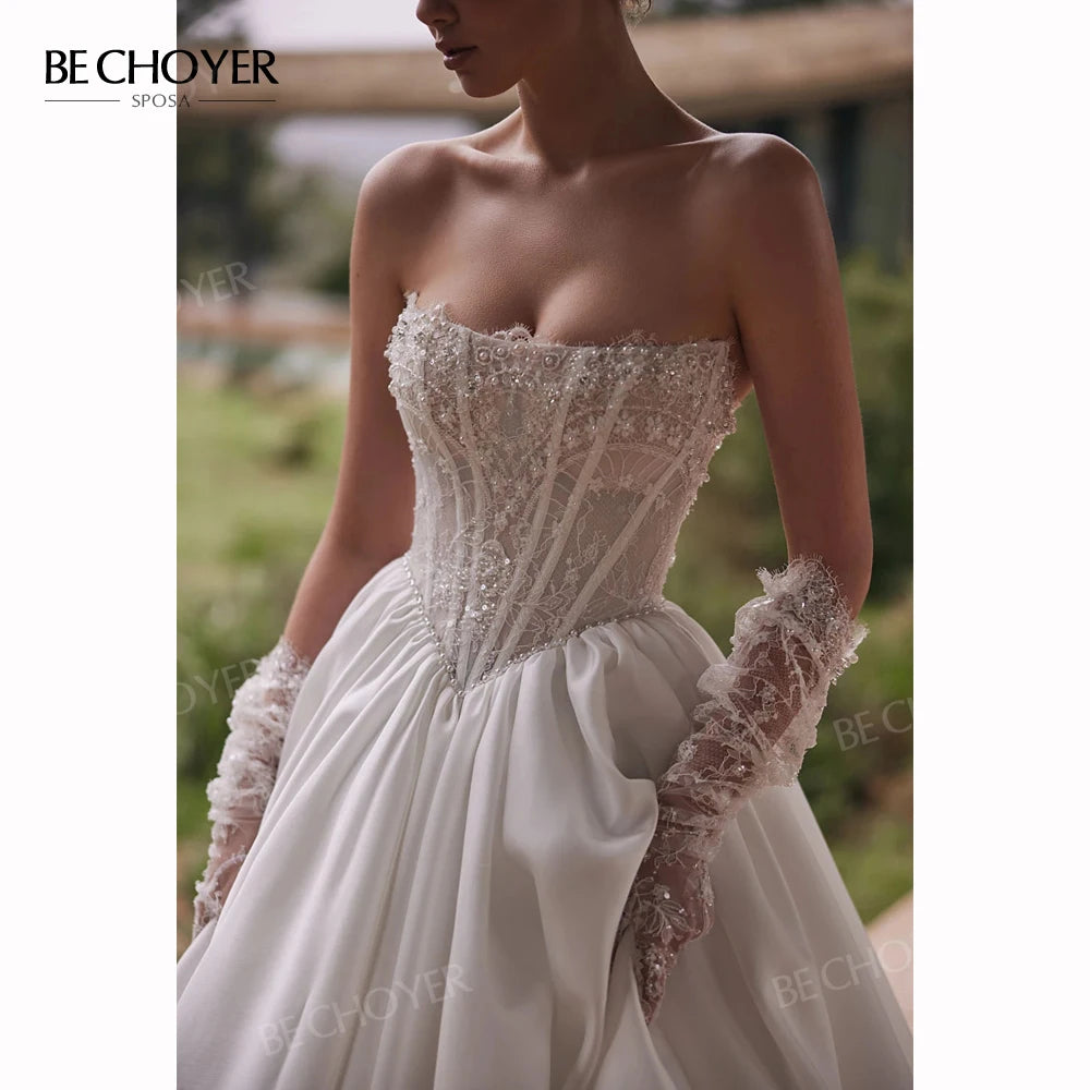 Robe de mariée satinée ligne A bustier – CLEVI Paris