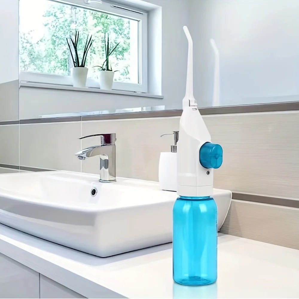 Irrigateur buccal manuel portable – CLEVI Paris