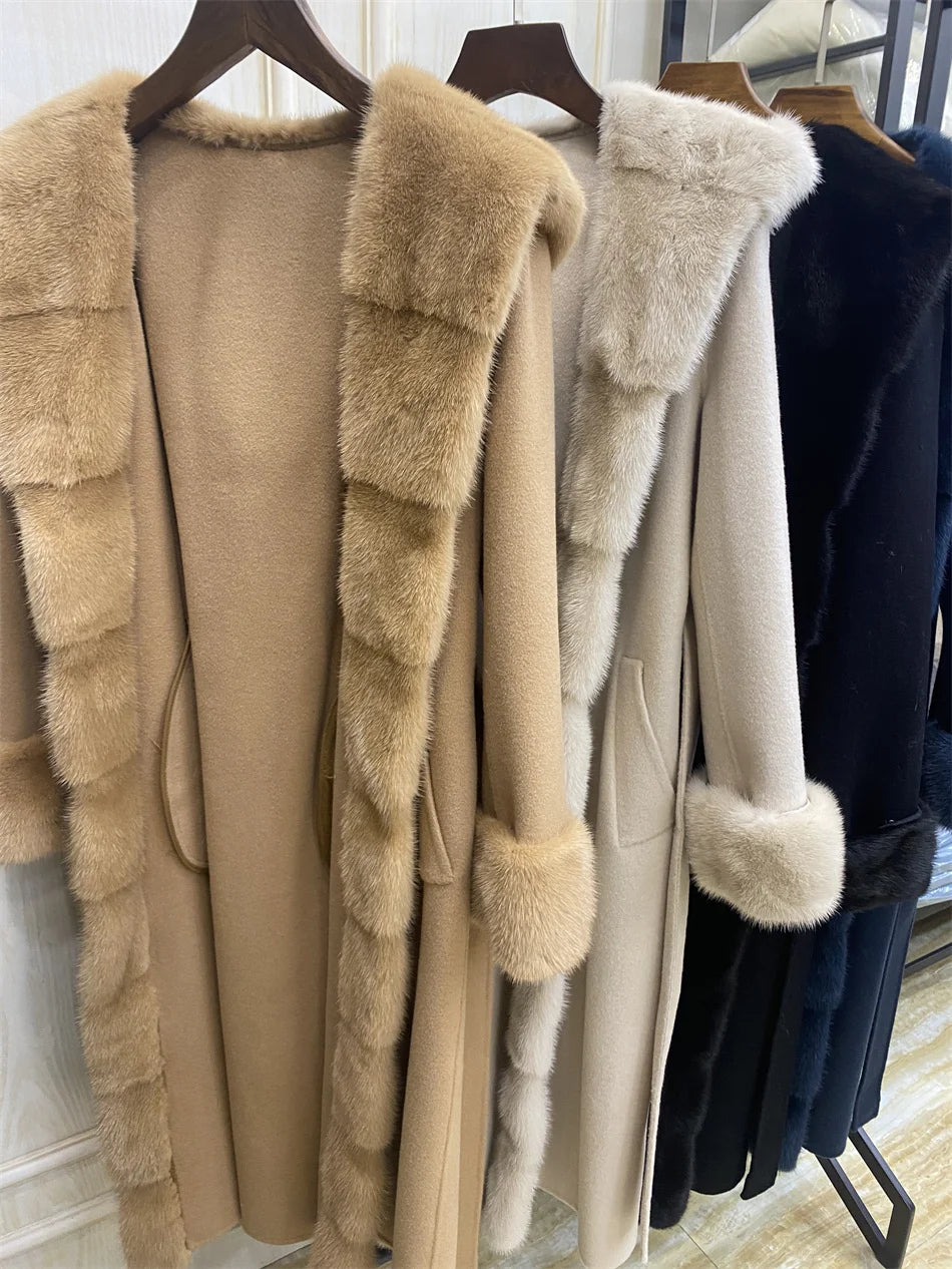 Manteau long femme à capuche et ceinture – CLEVI Paris
