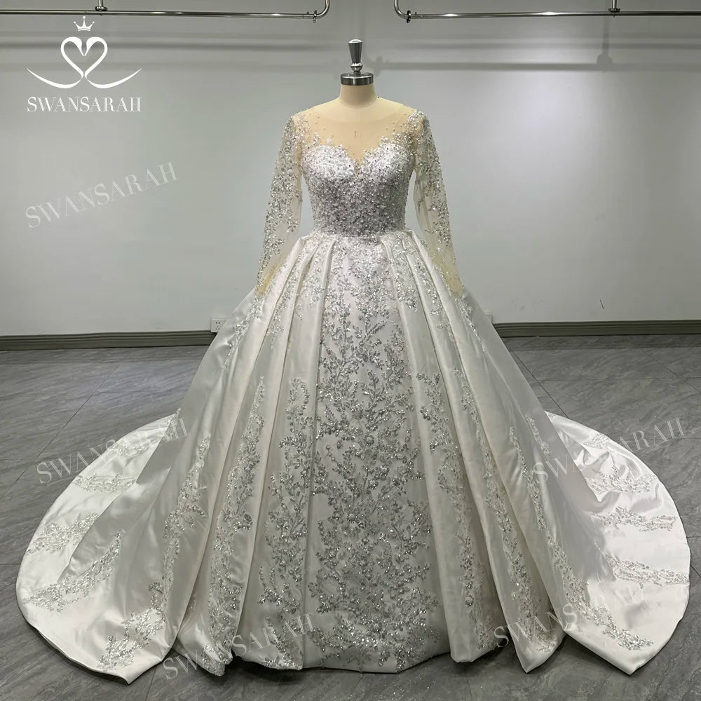 Robe de mariée princesse étagée et perlée – CLEVI Paris