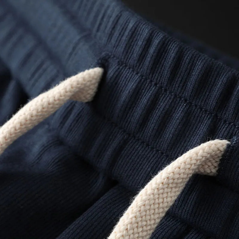 Survêtement homme à bandes et col zippé – CLEVI Paris