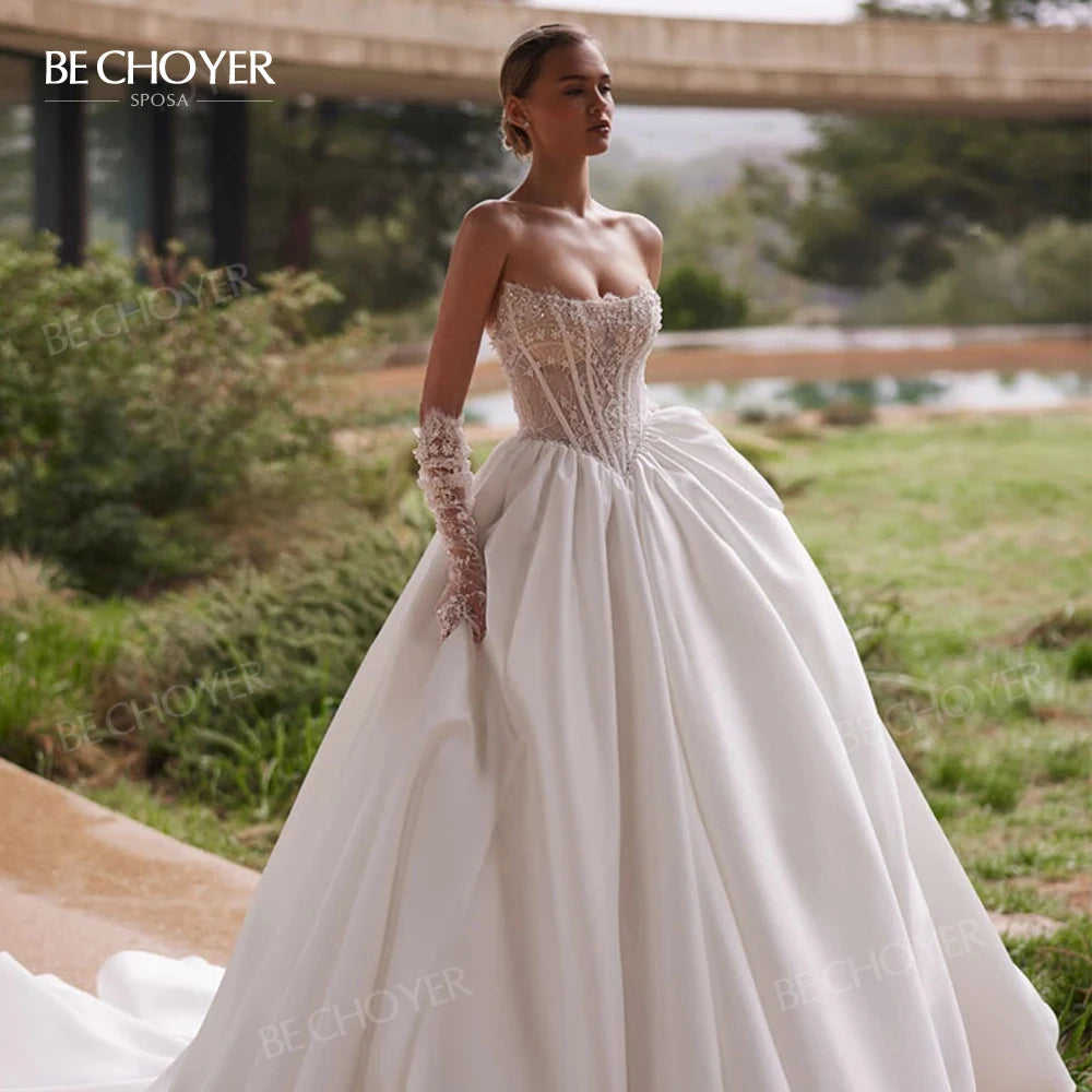 Robe de mariée ligne A sans manches en satin – CLEVI Paris