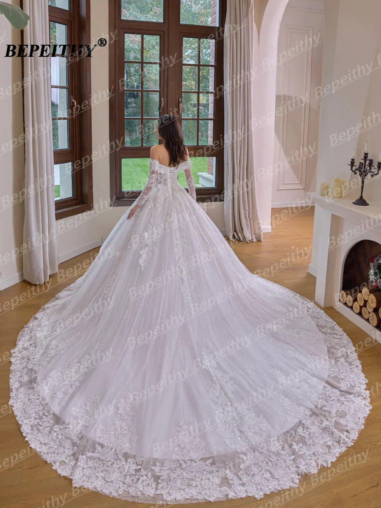 Robe de mariée princesse à perles – CLEVI Paris