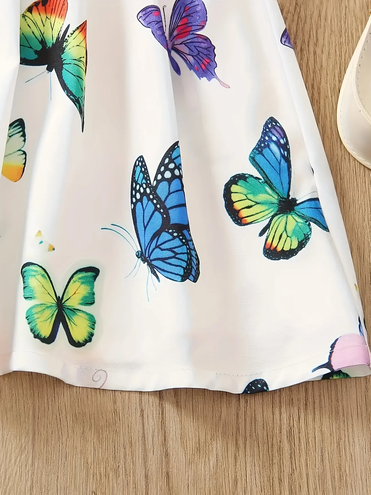 Robe fille blanche à imprimé papillons – CLEVI Paris