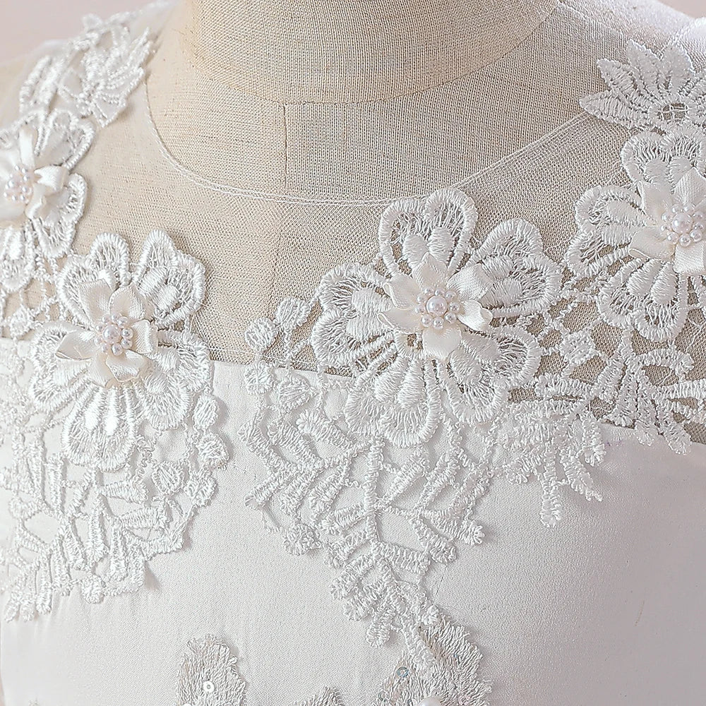 Robe longue fille en blanc à appliqués – CLEVI Paris
