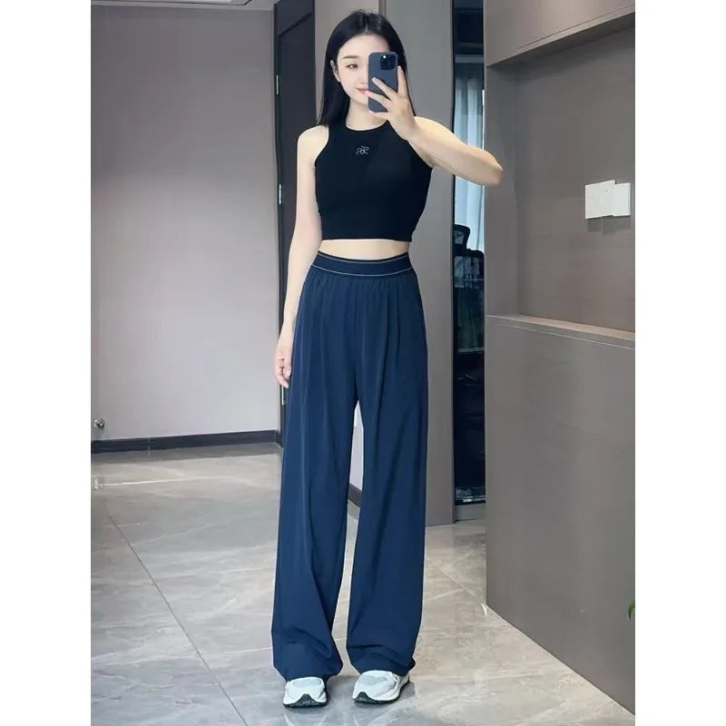 Pantalon femme ample à taille élastique – CLEVI Paris