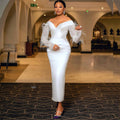 Robe de mariée fourreau à plumes – CLEVI Paris