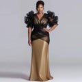Robe de soirée longue col V à plumes – CLEVI Paris